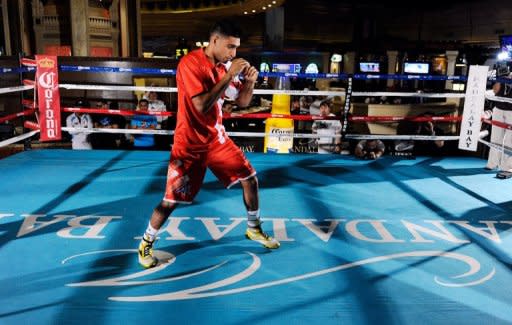 Boxer Amir Khan shadow boxes during a public workout session at the Mandalay Bay Resort & Casino in Las Vegas, Nevada. Khan will take on Danny Garcia for the WBC super lightweight world championship on July 14 in Las Vegas