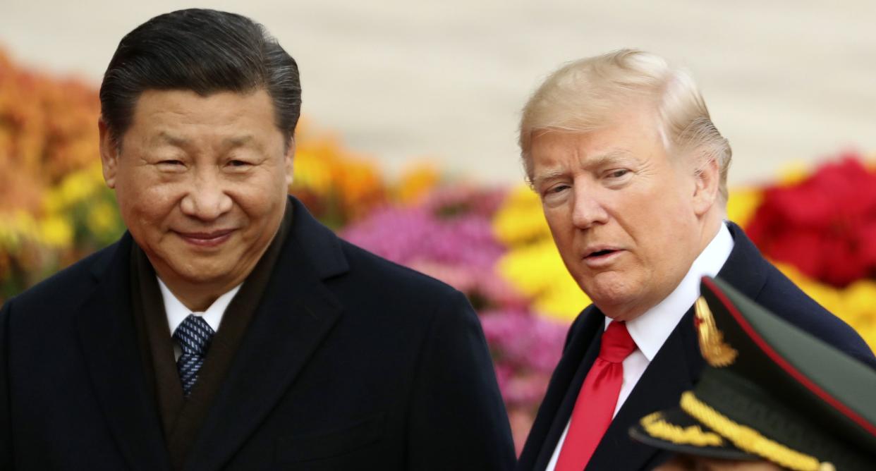 Trade warriors? President Trump with Chinese President Xi Jinping in Beijing last year. (AP Photo/Andrew Harnik)