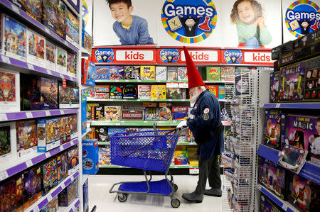 FILE PHOTO: Santa Fred Osther from Oslo, Norway shops at a Toys R Us during a field trip from the Charles W. Howard Santa Claus School in Midland, Michigan, U.S. October 28, 2016. REUTERS/Christinne Muschi/File Photo