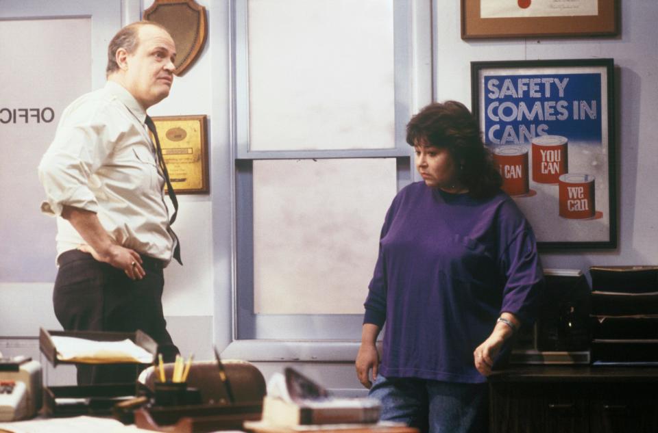 Actor Fred Thompson appears opposite sitcom star Roseanne Barr on the “Let’s Call It Quits” episode of her eponymous show “Roseanne.”