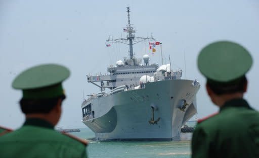 Vietnamese border guards watch the US Seventh Fleet's USS Blue Ridge enters Tien Sa port in April 2012. The United States will shift the majority of its naval fleet to the Pacific by 2020 as part of a new strategic focus on Asia, Pentagon chief Leon Panetta has told a summit in Singapore