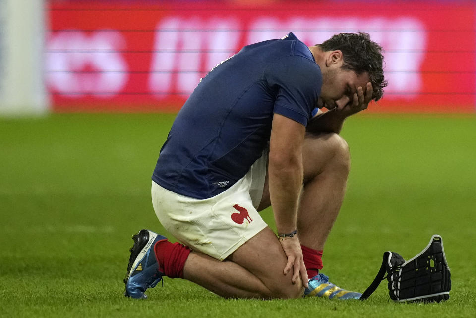 France's Antoine Dupont reacts after the end of the Rugby World Cup quarterfinal match between France and South Africa at the Stade de France in Saint-Denis, near Paris Sunday, Oct. 15, 2023. South Africa won the match 29-28. (AP Photo/Thibault Camus)