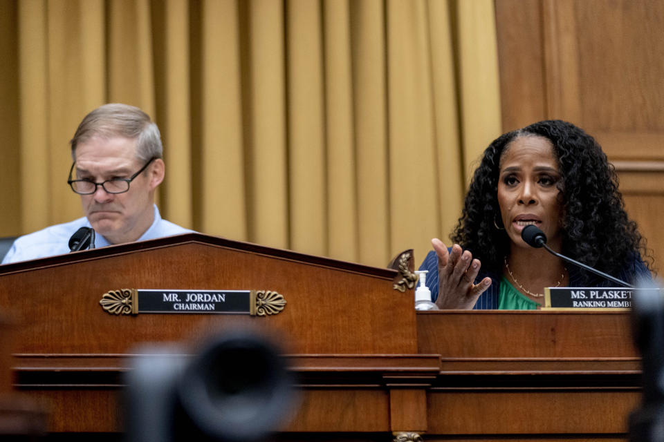 Ranking Member Del. Stacey Plaskett, D-V.I., accompanied by Chairman Jim Jordan, R-Ohio, speaks during a House Judiciary subcommittee hearing on what Republicans say is the politicization of the FBI and Justice Department and attacks on American civil liberties, on Capitol Hill in Washington, Thursday, May 18, 2023. (AP Photo/Andrew Harnik)