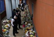 British police officer shot dead at custody centre in south London