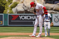 Los Angeles Angels pitcher Shohei Ohtani, of Japan, stands on the mound before being taken out of the game after walking in his second run during the second inning of a baseball game against the Houston Astros Sunday, Aug. 2, 2020, in Anaheim, Calif. (AP Photo/Mark J. Terrill)