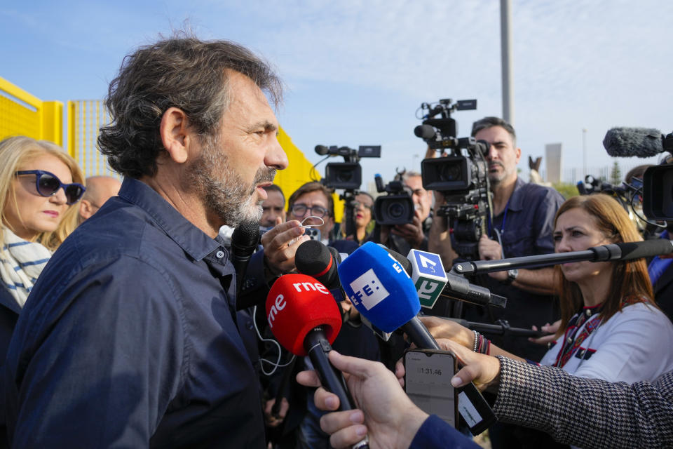 Open Arms founder Oscar Camps talks to the media as he arrives at a at Palermo's court room where a trial against former Italian minister of interior Matteo Salvini, accused for the kidnapping of migrants, is being held, Saturday, Oct. 23, 2021. Salvini is accused of kidnapping more than one hundred migrants and keeping them for weeks on board of the small Open Arms rescue boat in front of the coasts of Lampedusa, after refusing to let it dock in an Italian port, in 2019. (AP Photo/Gregorio Borgia)