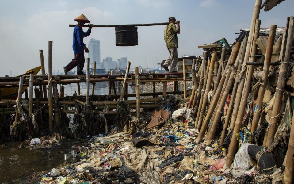 While extreme poverty has declined everywhere, the middle class has hardly expanded at all in South Asia and Africa - Getty Images AsiaPac