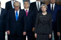 <p>President Donald Trump stands with British Prime Minister Theresa May during a group photo with NATO leaders at the new NATO headquarters, Thursday, May 25, 2017, in Brussels. (AP Photo/Evan Vucci) </p>