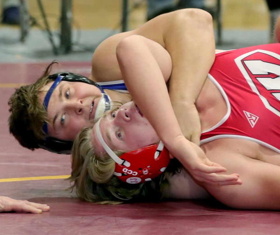 CVCA 215 pounder Kyle Snider pins Wadsworth's Maverick Blackburn during the Ironman Wrestling Tournament on Friday, Dec. 10, 2021 in Cuyahoga Falls, at Walsh Jesuit High School.