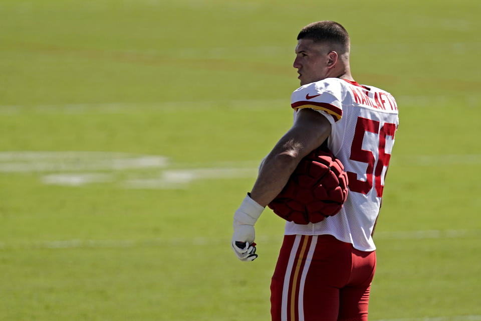 Kansas City Chiefs defensive end George Karlaftis watches practice during NFL football training camp Thursday, Aug. 11, 2022, in St. Joseph, Mo. (AP Photo/Charlie Riedel)