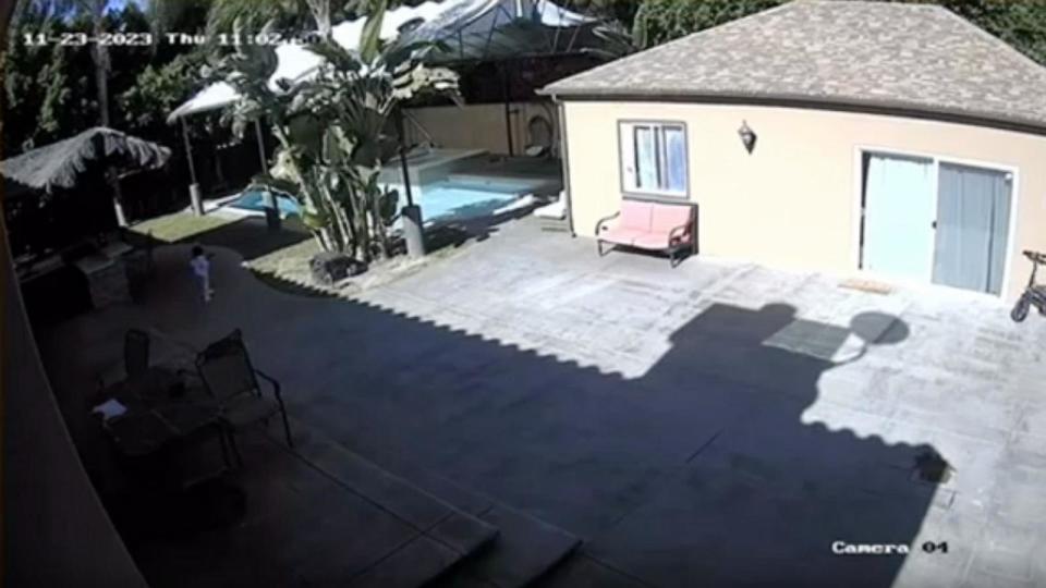 PHOTO: Home surveillance video provided by Kirsten Atkinson shows her niece Madison entering the backyard pool at Atkinson’s home before she had to be rescued by family members. (Courtesy of Kirsten Atkinson)