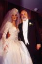 <p>Celine Dion wore an iconic ball gown with a 20-foot train to marry her manager, René Angélil. She accessorized with a headpiece that sparkled with 2,000 Austrian crystals. My heart will go on!</p>