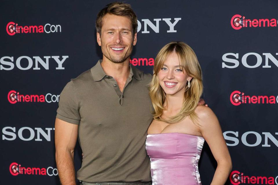 <p>Ethan Miller/Getty </p> Glen Powell (L) and Sydney Sweeney (R).