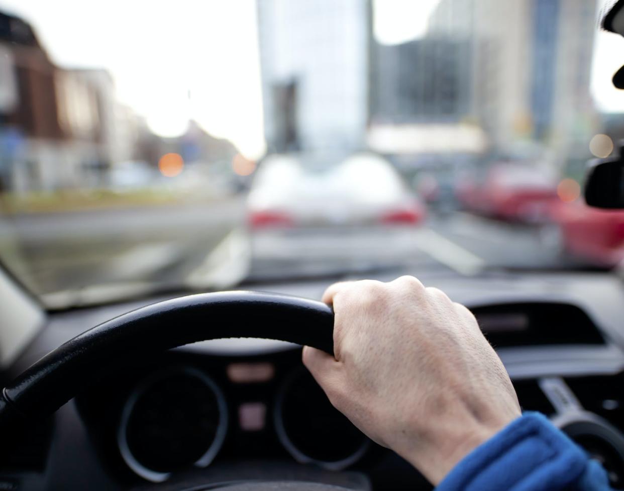 Commuting can create a ‘liminal space.’ <a href="https://www.gettyimages.com/detail/photo/traffic-jam-from-the-drivers-perspective-royalty-free-image/1285694174?phrase=person%20driving%20traffic%20gridlock" rel="nofollow noopener" target="_blank" data-ylk="slk:mikroman6/Moment via Getty Images;elm:context_link;itc:0;sec:content-canvas" class="link ">mikroman6/Moment via Getty Images</a>