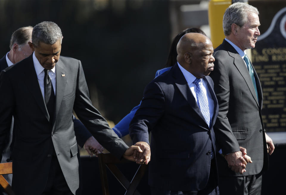 President Barack Obama, Rep. John Lewis, and former President George W. Bush hold hands on March 7, 2015, during a ceremony marking the 50th anniversary of the "Bloody Sunday" events at the Edmund Pettus Bridge in Selma, Alabama. (Photo: ASSOCIATED PRESS)