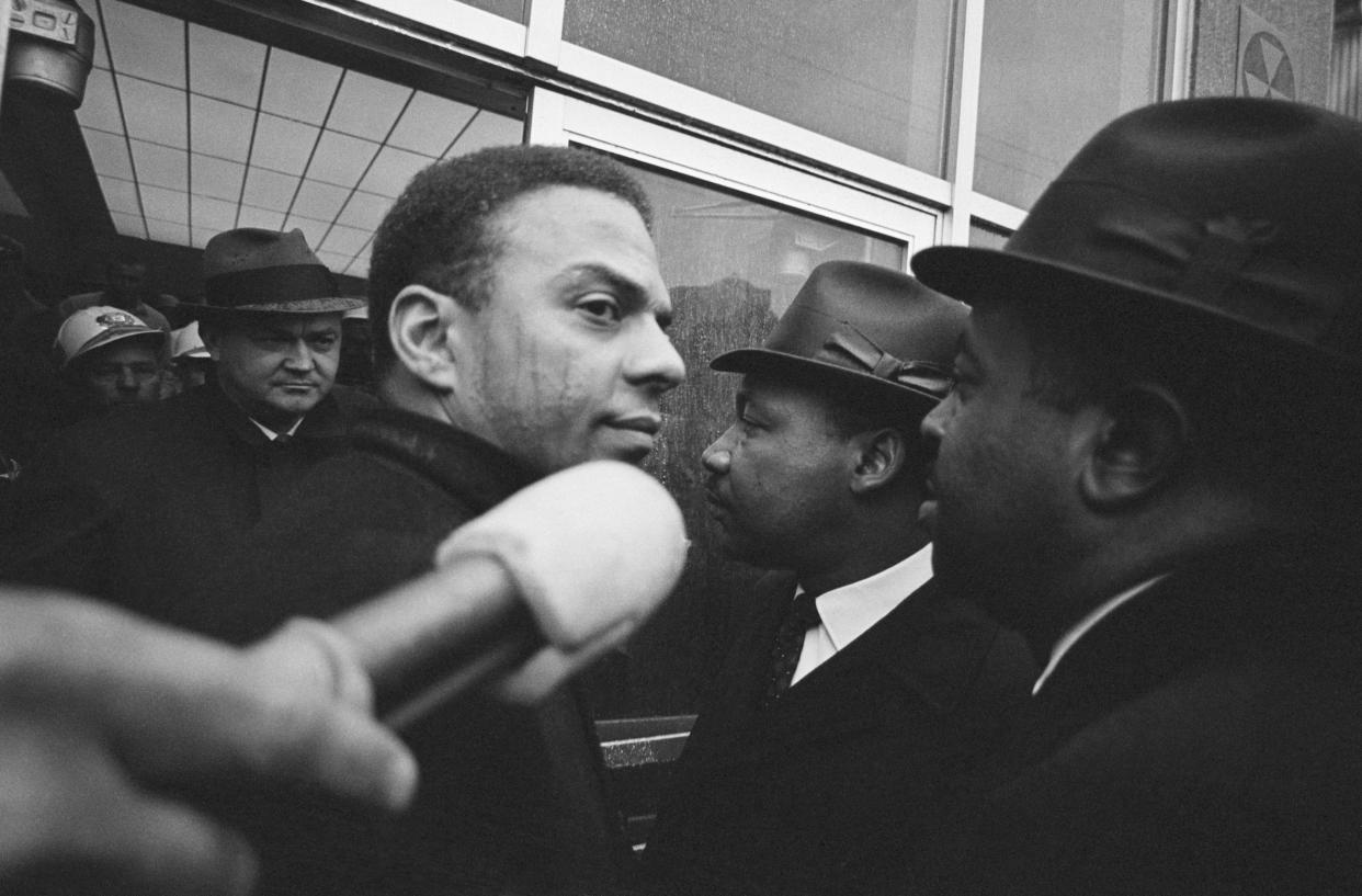 (Original Caption) 3/1/1965-Selma, AL: Dallas County Sheriff Jim Clark (L) stands in the doorway of Dallas County Courthouse to prevent the entrance of Civil Rights Leaders Reverend Andrew Young (2nd from L), Reverend Martin Luther King Jr. (C), and Ralph Abernathy (R). (Photo by © Bettmann/CORBIS/Bettmann Archive)