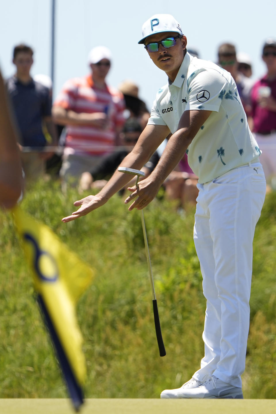 Rickie Fowler reacts as he misses a birdie putt on the eighth hole during the first round of the PGA Championship golf tournament on the Ocean Course Thursday, May 20, 2021, in Kiawah Island, S.C. (AP Photo/David J. Phillip)