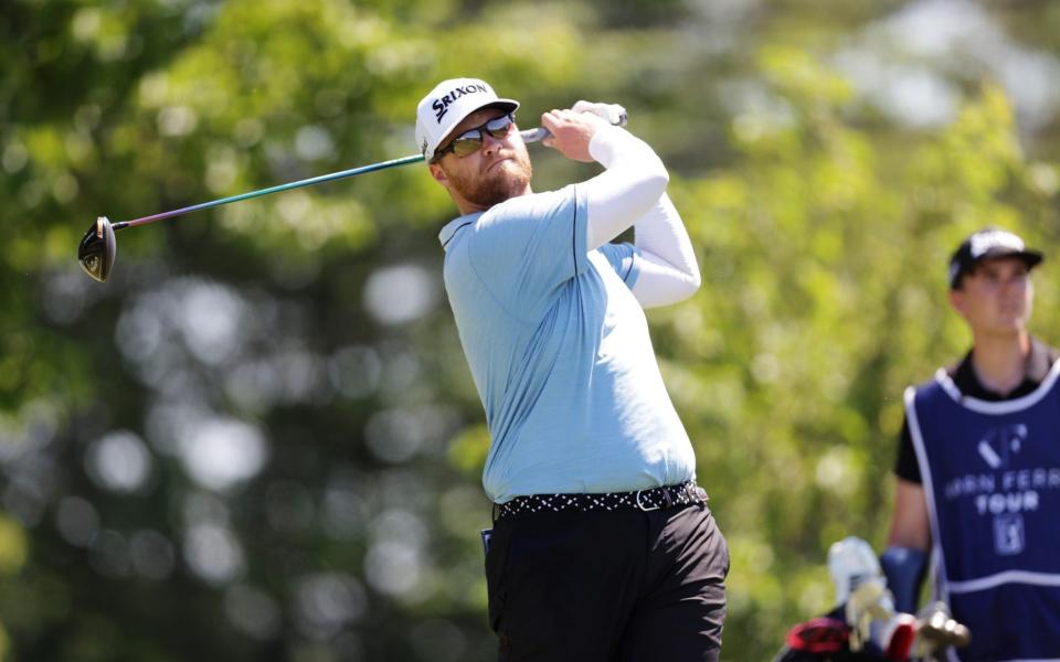 JJ Grey of England plays his shot from the 18th tee during the third round of the Live and Work in Maine Open at Falmouth Country Club on June 25, 2022 in Falmouth, Maine - Getty Images/Omar Rawlings