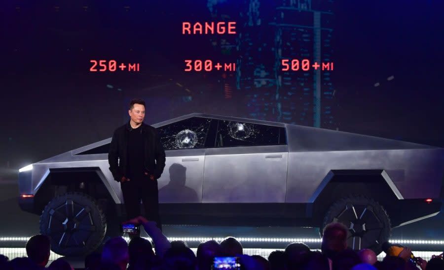 Tesla co-founder and CEO Elon Musk stands in front of the newly unveiled all-electric battery-powered Tesla Cybertruck at Tesla Design Center in Hawthorne, Calif., Nov. 21, 2019.