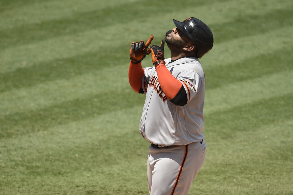 San Francisco Giants designated hitter Pablo Sandoval looks up at home plate off a two-run home run during the second inning of a baseball game against the Los Angeles Angels in Anaheim, Calif., Tuesday, Aug. 18, 2020. (AP Photo/Kelvin Kuo)