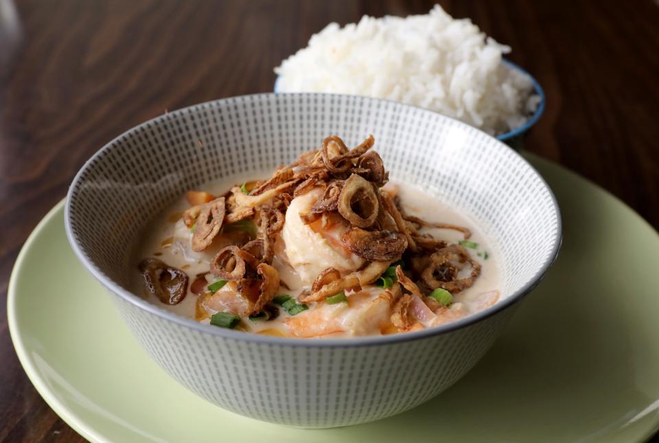 The Shrimp Adobo, with a rice vinegar and coconut milk broth, with yams and crispy shallots at Karenderya restaurant on Main Street in Nyack, Jan. 16, 2019.