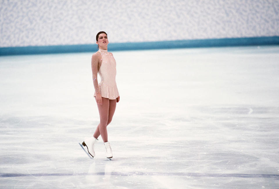 Nancy Kerrigan in a white dress with illusion sleeves