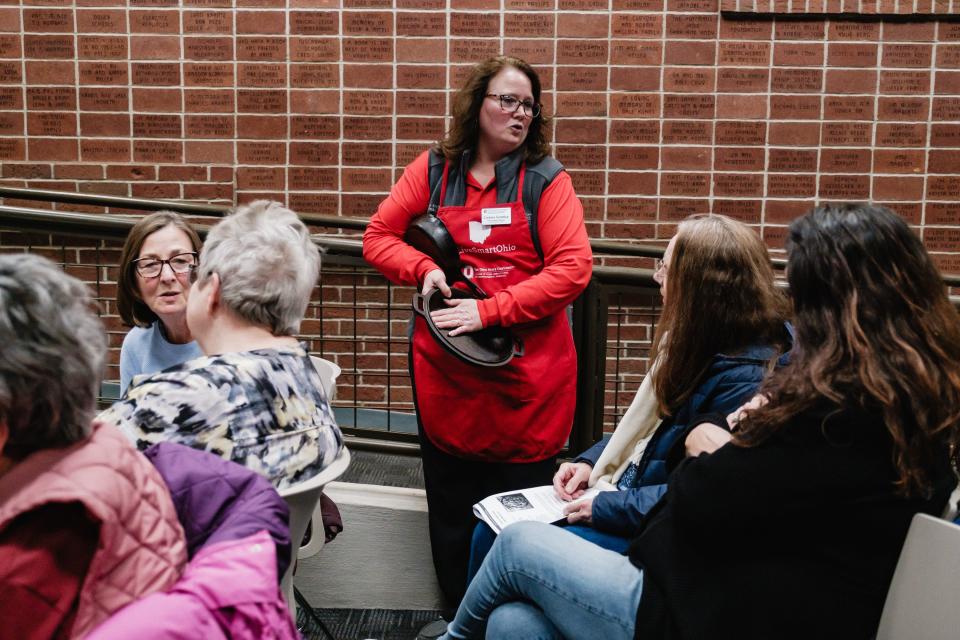 Corinna Gromley, an educator with The Ohio State University Extension, talks about proper care for cast iron cookware, at the Dover Public Library.