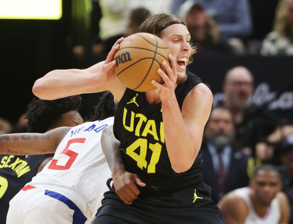 Utah Jazz forward Kelly Olynyk (41) is fouled by LA Clippers guard <a class="link " href="https://sports.yahoo.com/nba/players/6568" data-i13n="sec:content-canvas;subsec:anchor_text;elm:context_link" data-ylk="slk:Bones Hyland;sec:content-canvas;subsec:anchor_text;elm:context_link;itc:0">Bones Hyland</a> (5) in Salt Lake City on Friday, Oct. 27, 2023. | Jeffrey D. Allred, Deseret News