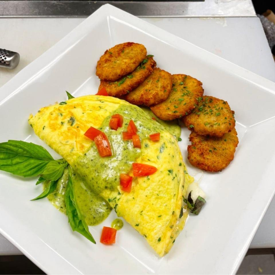 The Garden Omelet with fresh mozzarella, tomato, basil and a light pesto hollandaise is served with a side of potato cakes. It's available for brunch on Saturday and Sundays at CAM Cafe in Wilmington's Cameron Art Museum.