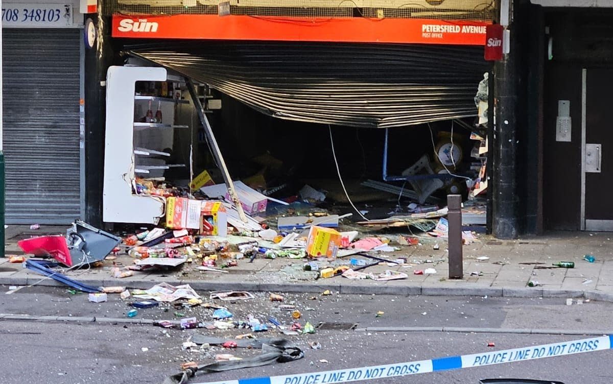 Several masked men used a pick-up truck to pull an ATM machine out of the damaged shop