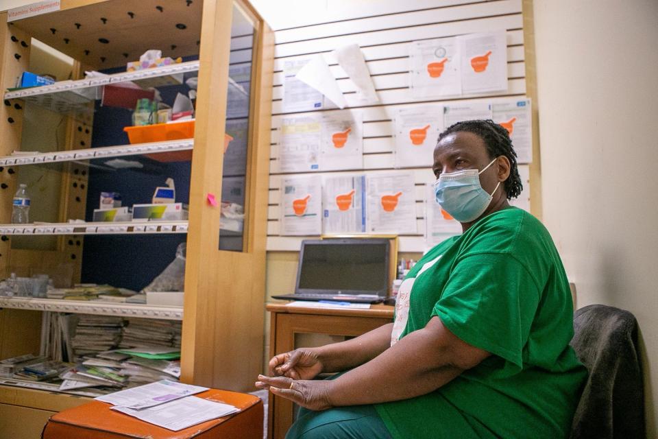 Independent pharmacy owner, Ijeoma Nnani, of Trio Pharmacy shares details of the COVID-19 vaccination process at 1570 Cleveland Ave on Friday, April 16, 2021. [Maddie Schroeder/For The Dispatch]