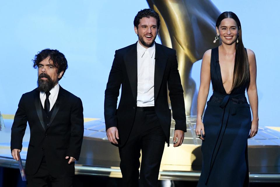 Dinklage, Harington, and Clarke making their entrance.