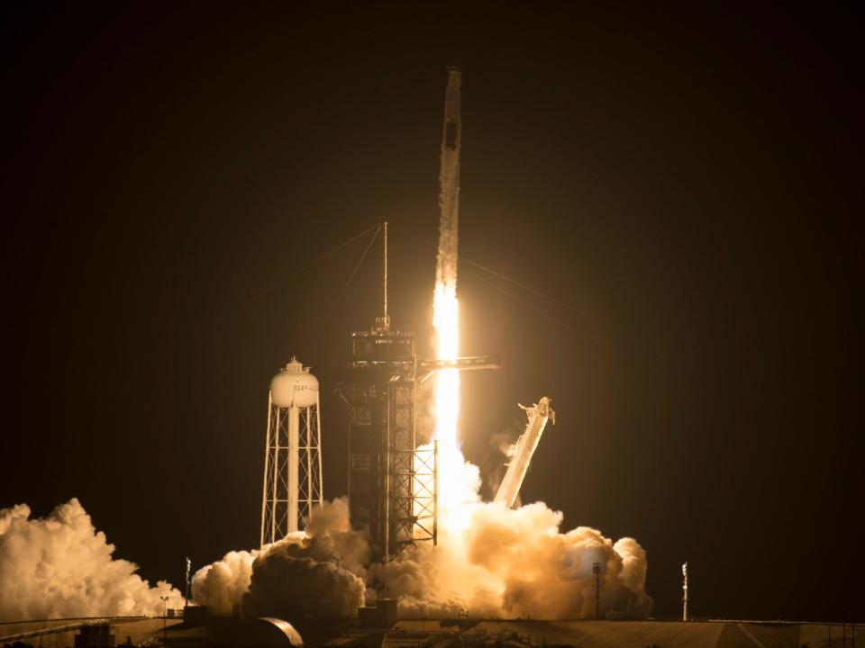 falcon 9 rocket launches at night