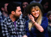 <p>Anne V and Adam Levine attend the Denver Nuggets and Los Angeles Lakers basketball game in 2011. </p>