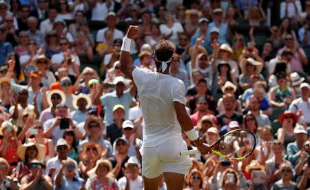 Tennis - Wimbledon - All England Lawn Tennis and Croquet Club, London, Britain - July 7, 2018 Spain's Rafael Nadal celebrates winning the third round match against Australia's Alex De Minaur REUTERS/Andrew Boyers