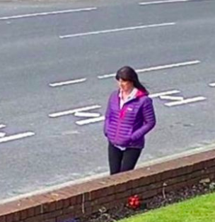 Last seen: Police released images of Mrs Birbeck walking along a road near the cemetery where she was found. (Lancashire police)