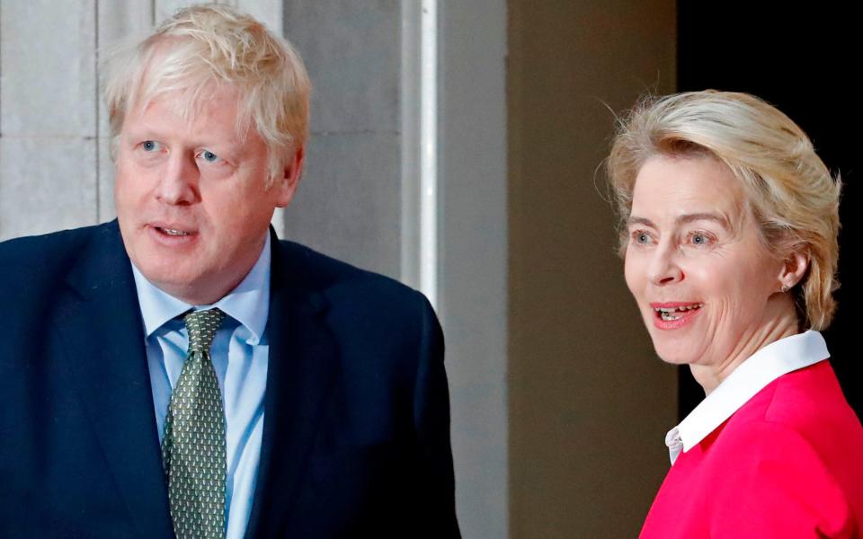Boris Johnson with Mrs von der Leyen earlier this year.  - AFP