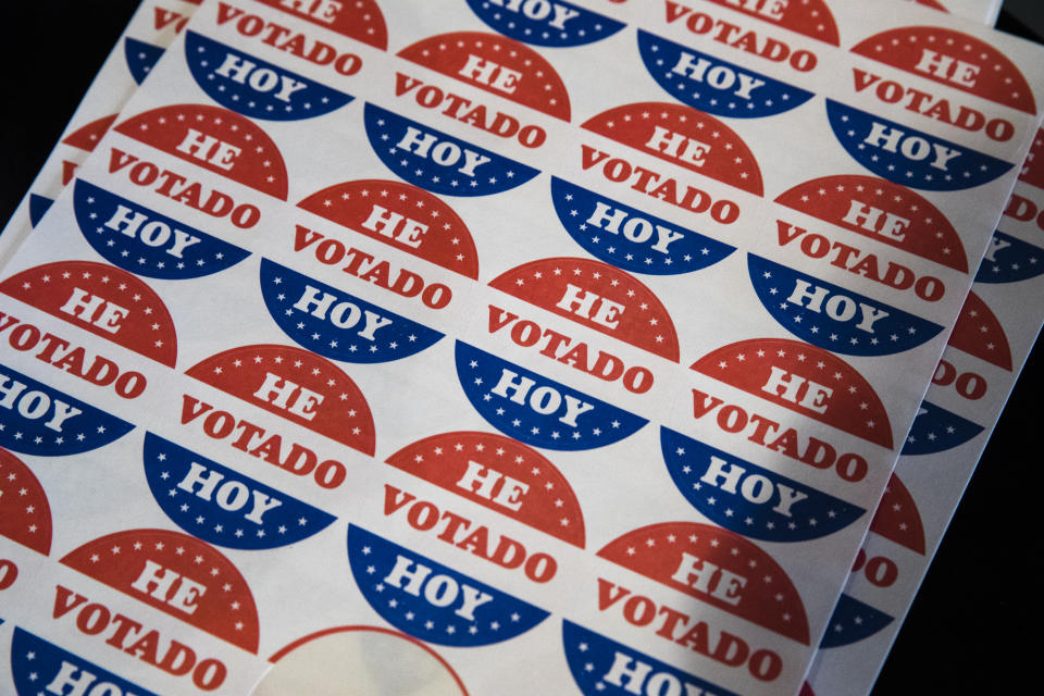 FILE - Shown in the Spanish language are "He Votado Hoy" stickers or I voted today at a polling place in Philadelphia, May 21, 2019. This month’s elections may have offered a preview of the Spanish-language misinformation that could pose a growing threat to Democrats, who are already anxious about their standing with Latino voters after losing some ground with them last year. (AP Photo/Matt Rourke, File)