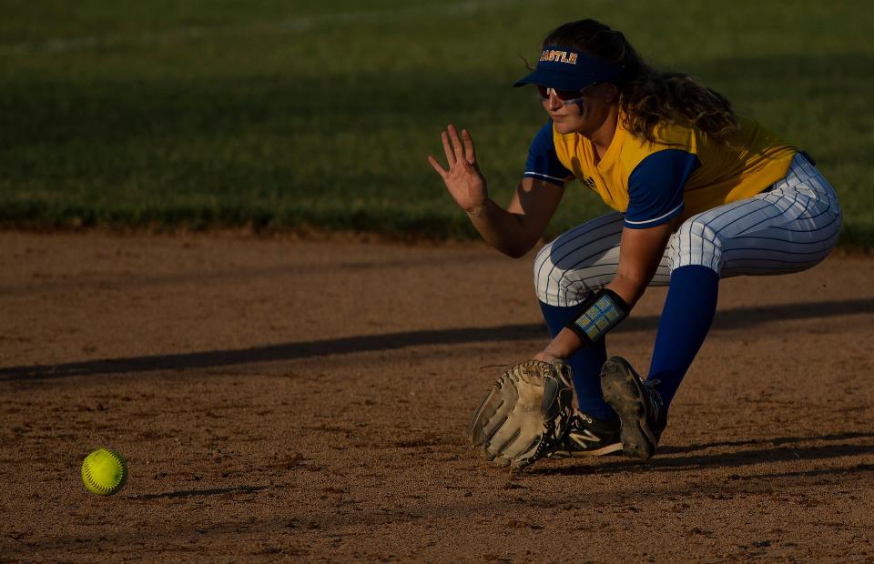 Castle's Jackie Lis (1) fields a Central grounder during their sectional championship game at North High School Saturday evening, May 28, 2022.
