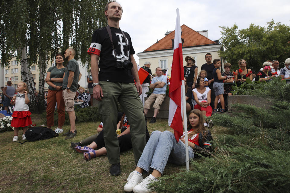 Supporters of the far-right organization National-Radical Camp, ONR, take part in the commemoration of the 1944 Warsaw Uprising, in Warsaw, Poland, Monday Aug. 1, 2022. Poles are marking the 78th anniversary of the Warsaw Uprising, a doomed revolt against Nazi German forces during World War II. (AP Photo/Michal Dyjuk)