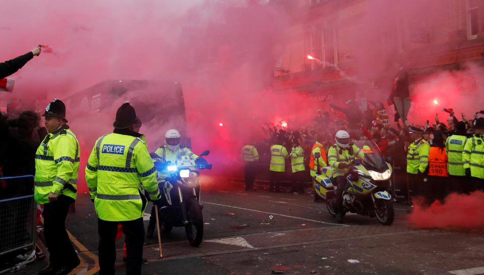 <p>Soccer Football – Champions League Quarter Final First Leg – Liverpool vs Manchester City – Anfield, Liverpool, Britain – April 4, 2018 Liverpool fans set off flares and throw missiles at the Manchester City team bus outside the stadium before the match Action Images via Reuters/Carl Recine </p>