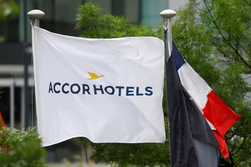 FILE PHOTO: The logo of French hotel operator AccorHotels is seen on a flag pole at the financial and business district of La Defense in Puteaux