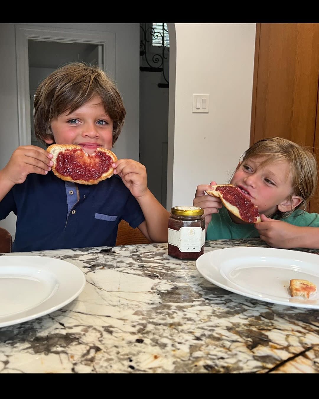 kids eating jam at table