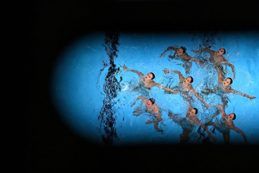 USA’s team compete in the final of the team free artistic swimming event during the 2024 World Aquatics Championships at Aspire Dome in Doha on February 9, 2024. (Photo by MANAN VATSYAYANA / AFP) (Photo by MANAN VATSYAYANA/AFP via Getty Images)