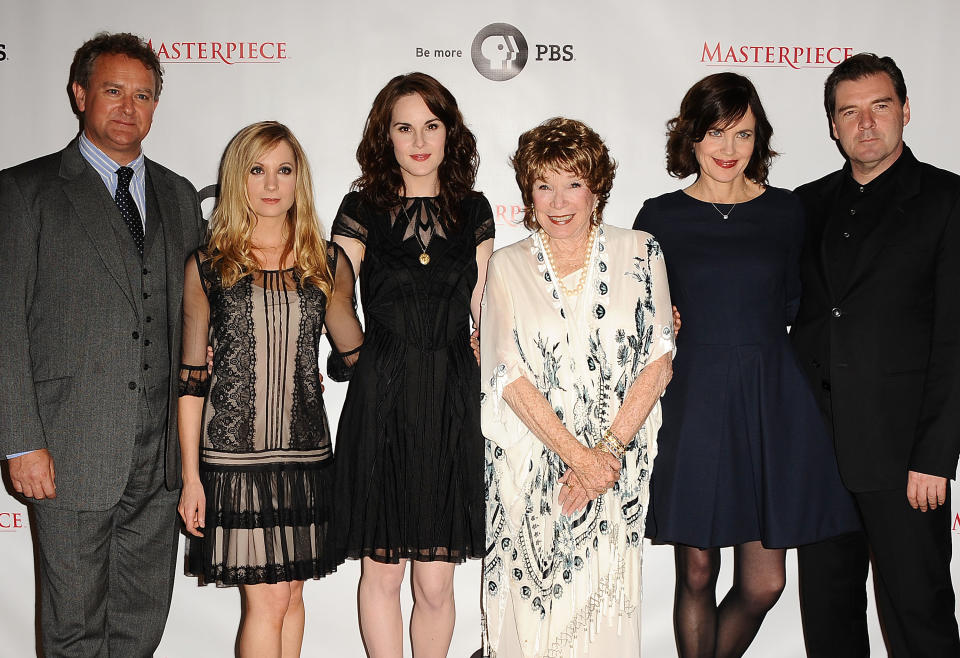 BEVERLY HILLS, CA - JULY 21: (L-R) Hugh Bonneville, Joanne Froggatt, Michelle Dockery, Shirley MacLaine, Elizabeth McGovern and Brendan Coyle attend the "Downton Abbey" photo call at the Beverly Hilton Hotel on July 21, 2012 in Beverly Hills, California. (Photo by Jason LaVeris/FilmMagic)