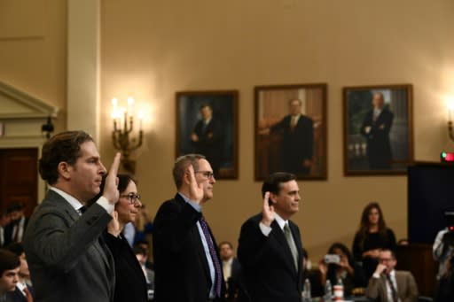 US constitutional experts take the oath of office at a House Judiciary Committee hearing on the impeachment of President Donald Trump