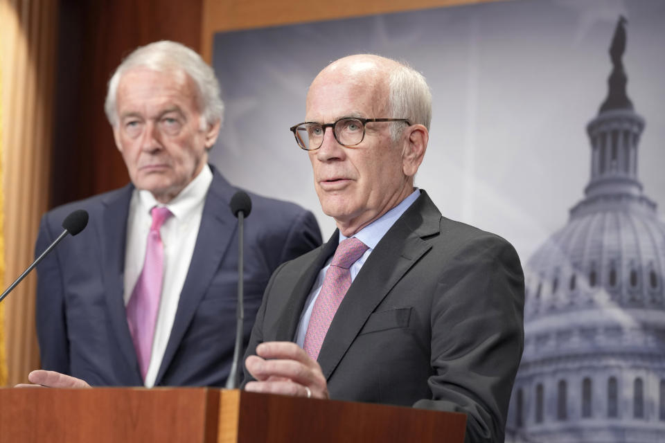 Sen. Peter Welch, D-Vt., right, speaks as Sen. Edward Markey, D-Mass., left, listens during a news conference on the debt limit, Thursday, May 18, 2023, on Capitol Hill in Washington. (AP Photo/Mariam Zuhaib)