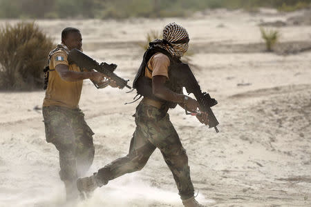 Nigerian special forces conduct a mock casualty evacuation during Flintlock 2015, an American-led military exercise, in Mao, February 22, 2015. REUTERS/Emmanuel Braun