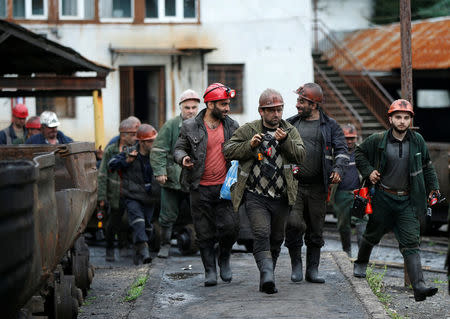 Miners leave the Mindeli coal mine after their shift in Tkibuli, Georgia, July 13, 2018. REUTERS/David Mdzinarishvili