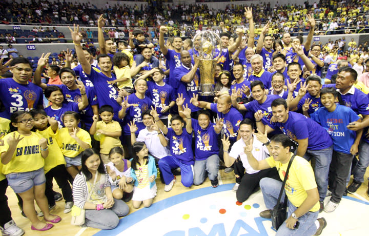 The Talk 'N Text Tropang Texters celebrate after beating the Rain or Shine Elastopainters, 105-82, to win the Philippine Cup. (PBA Images)